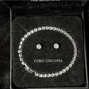 Stud earrings and a tennis bracelet